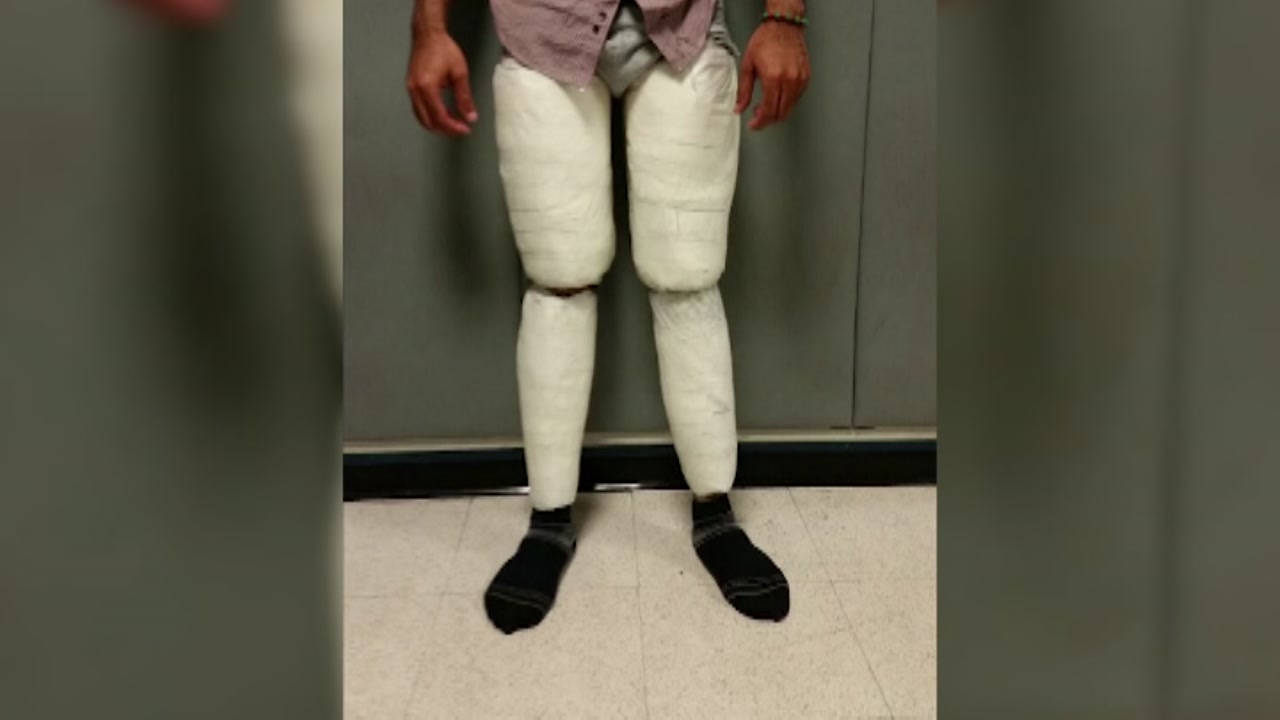 Traveler caught with 10 lbs of cocaine strapped to legs
